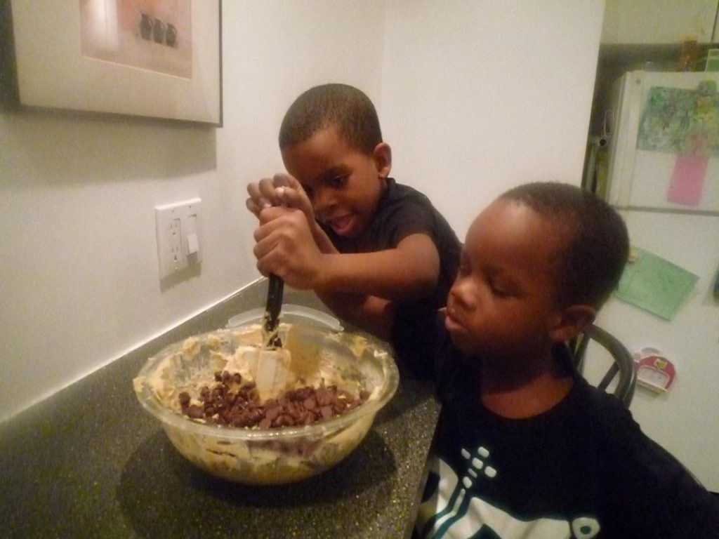 Kids helping to make easy chocolate chip chookies
